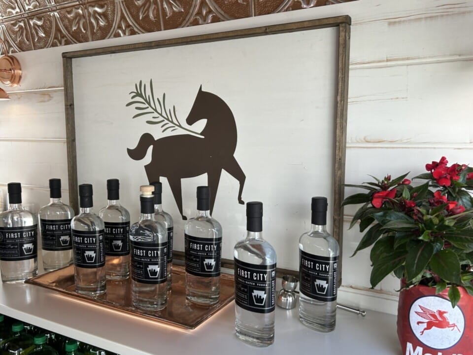 Copper Pony - A group of bottles of alcohol on a tray.